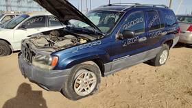 05093180aa Jeep 02-04 Grand Cherokee Passenger Right Front Brake Caliper With Mount Bracket