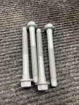 Genuine Box Of Ford Caliper Mount Bolt W722051-S439. Fixed Price $11.25.