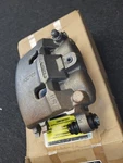 New Motorcraft Left Rear Unloaded Disc Brake Caliper BRCF-59 Light Rust Ford. Fixed Price $39.99.