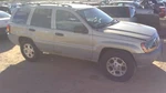 Passenger Caliper Front Black Color Fits 99-02 Grand Cherokee 322170. Fixed Price $50.00.