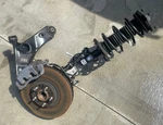 20-24 Kia Telluride Fwd Front Left Driver Side Suspension Knee Assembly # 107182. Fixed Price $501.60.